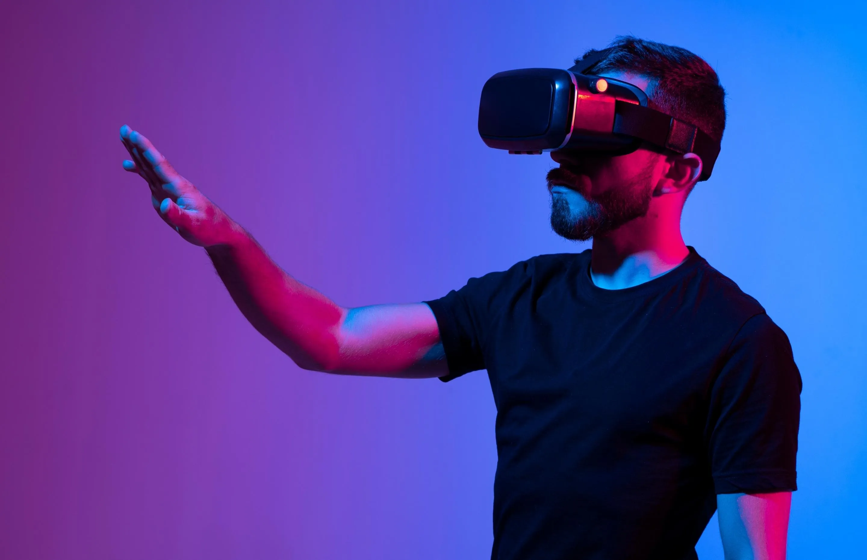 A man Standing wearing VR